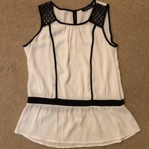 Beautiful top with cinched waist and lace accent